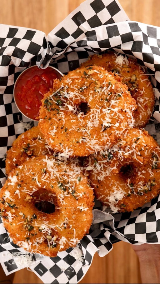 Hanging with loved ones, Crispy Chicken Parm Onion rings, and an ice-cold Coca-Cola. A Recipe for Magic. Recipe link in bio! @CocaCola #RecipeForMagic #ad