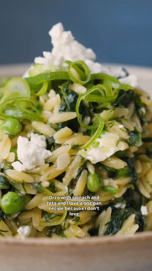 Here’s how to make @clarkbar’s One-Pan Orzo With Spinach and Feta:

• 2 tablespoons unsalted butter
• 4 large scallions, trimmed and thinly sliced
• 2 large garlic cloves, minced
• 8 ounces baby spinach leaves (8 cups), coarsely chopped
• 1 teaspoon kosher salt
• 1¾ cups low-sodium chicken or vegetable stock
• 1 cup orzo
• 1 teaspoon finely grated lemon zest (from 1 lemon)
• ¾ cup crumbled feta (3 ounces), plus more for garnish
• ½ cup frozen peas, thawed (optional)
• 1 cup chopped fresh dill, or use parsley or cilantro

Heat a 10-inch skillet over medium, then melt butter, 30 seconds to 1 minute. Stir in about three-quarters of the scallions (saving some of the green parts for garnish) and garlic, and cook until softened, stirring frequently, about 3 minutes.

Stir in spinach, adding in batches if it doesn’t all fit in the pan at once, and ½ teaspoon salt. Continue to cook, stirring occasionally, until spinach is wilted, about 5 minutes.

Stir in stock and bring to a simmer. Stir in orzo, lemon zest and remaining ½ teaspoon salt. Cover and simmer over medium-low heat until orzo is nearly cooked through and most of the liquid is absorbed, 10 to 14 minutes, stirring once or twice.

Stir in cheese, peas (if you like) and dill, cover the pan, and cook for another 1 minute, to finish cooking and warm the peas. To serve, sprinkle with more cheese and the reserved scallions.