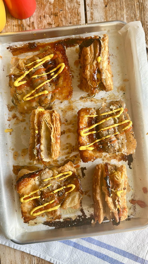 Upside Down Hot Dogs

Welcome back to Upside Down Cooking and today we’re celebrating the end of the summer with these Upside Down Hot Dogs

I’m laying succulent pork sausages onto a baking tray drizzled with oil and seasoning and scattered with onions 

I’m then slathering onion jam onto puff pastry squares and these get laid over the top.

A quick brush with egg wash and a blast in a hot oven till golden brown, then we flip them over, dress the with ketchup and mustard and we have the ultimate, any season, any weather, upside down hot dogs of joy!

I used the wonderful onion jam from @tracklements 

#upsidedown #pastry #hotdog #bbq #summerfood