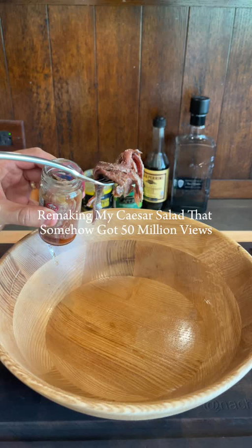 Remaking my most popular video… a Caesar salad | Full recipe ⬇️

This entire salad is prepared in a wooden bowl for maximum flavor and tradition. The one I use is linked in my Amazon storefront—check the link in my bio.

Tequila is from @tequilatrujilloforus 

⸻

Ingredients

For the Dressing
	•	1/4 cup fresh lemon juice
	•	1/2 tsp Worcestershire sauce
	•	1 egg yolk
	•	2 anchovy fillets
	•	2 garlic cloves, minced
	•	1 tsp Dijon mustard
	•	1–2 tsp capers, mashed
	•	1 oz grated Parmesan
	•	1/2 cup extra virgin olive oil
	•	1 tablespoon tequila (silver or reposado)
	•	Salt & freshly ground black pepper, to taste

For the Salad
	•	12 oz romaine lettuce, torn into bite-sized pieces
	•	1 oz grated Parmesan
	•	Optional: Croutons & extra capers for garnish

⸻

Directions

Make the Dressing in the Wooden Bowl:
In the wooden salad bowl, mash the anchovies, capers, and garlic into a smooth paste using the back of a spoon or a pestle. Add the Dijon mustard and mix until combined.

Add Flavor & Body:
Whisk in the fresh lemon juice, tequila, egg yolk, Worcestershire sauce, and black pepper directly in the bowl.

Emulsify:
While whisking, slowly drizzle in the olive oil until the dressing becomes creamy and emulsified.

Finish the Dressing:
Stir in the Parmesan cheese. Taste and adjust seasoning—remember, the anchovies and capers already add plenty of salt.

Assemble the Salad:
Add the romaine directly into the wooden bowl with the dressing. Toss until every leaf is evenly coated.

Garnish & Serve:
Sprinkle with extra Parmesan and garnish with croutons (and capers, if desired). Serve immediately.