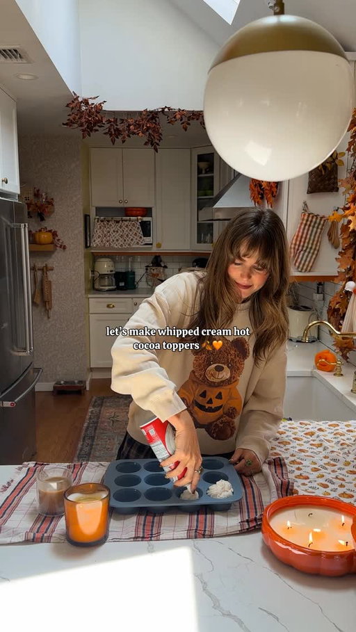 Halloween hot cocoa whipped cream hack 🎃🍂 save yourself from buying those marshmallow toppers, and make your own! 

1. Add whipped cream into a muffin tin (i like the silicone kind)
2. Use edible markers to decorate marshmallow & add it on top
3. Add sprinkles and freeze until hard! 

#halloween #halloweenrecipes