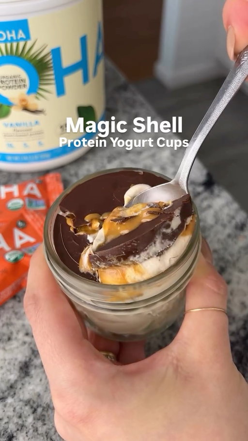 welcome back to episode 4 of the No-Bake Protein Treats series featuring @alohamoment plant-based protein! today we’re making the VIRAL magic shell PROTEIN YOGURT cups. they’re perfectly portioned little protein yogurt cups with an incredible 15 GRAMS of protein per cup! perfectly sweet, super quick + easy to make, and totally delicious. here’s how to make ‘em:
 
1 (5-ounce) container plain Greek yogurt, or non-dairy coconut yogurt
1 scoop Aloha Vanilla Protein Powder
1 Aloha Mini Peanut Butter Cup Protein Bar, chopped into small pieces
1 tablespoon peanut butter
2 tablespoons chocolate chips
½ teaspoon coconut oil
 
1. Mix together the yogurt and Aloha Vanilla Protein Powder in a small bowl.
2. Top the yogurt with the Aloha Mini Peanut Butter Cup Protein Bar pieces, then drizzle with peanut butter.
3. Melt together the chocolate chips and coconut oil in a microwave until smooth, then pour the melted chocolate over the yogurt. Transfer the yogurt to the freezer for about 15 minutes or until the chocolate has hardened, then remove and enjoy! 

#plantbased #plantpowered #healthydesserts #healthyrecipes #healthyliving #healthyfoods #glutenfreedairyfree #proteinrecipes #protein #proteindesserts #vegan #vegandesserts #veganrecipes #chocolateshell #yogurt