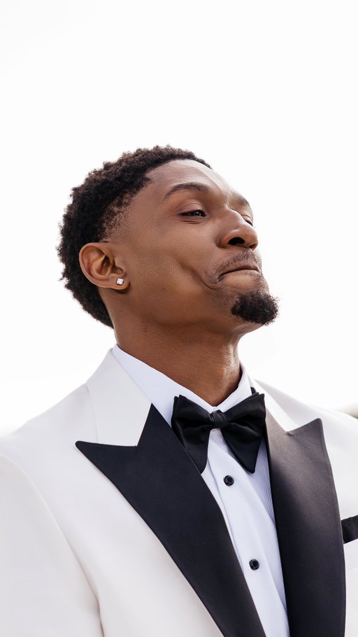 As Tank’s voice carried through the air, Bradley watched Kamiah walk down the aisle. A breathtaking, unforgettable moment at Pelican Hill resort! #BEENaBeal #bealsstilldo #blacklove 

🎥 @stanlophotography 
.
.
.
Planner/my sanity: @mindyweiss 
Photography: @stanlophotography 
Stylist: @firstlookbylauren @laurenhobbs Hair stylist: @hairiscoriej x@xobykamiah
MUA: @juanice.mua x @diorbeauty
Dress: @pninatornai
Shoes: @christianlouboutin suits: @albalegacy
Jewelry: @jasonofbeverlyhills
Location: @pelicanhillresort