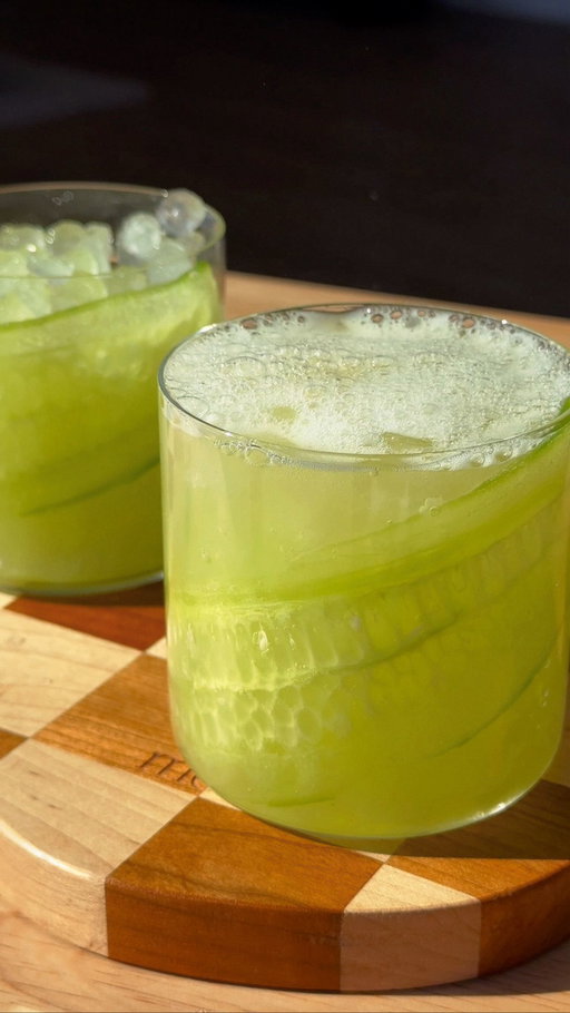I think some common misconceptions about mocktails are that they’re just juice and/or not complex in flavors. When in fact, neither is true! You can build simple, yet flavorful, mocktails that are gut friendly + delicious. Here’s how: 

𝐰𝐡𝐚𝐭 𝐲𝐨𝐮’𝐥𝐥 𝐧𝐞𝐞𝐝:⁣
• 1 cucumber 
• 1 ginger root, whole 
• 6 oz of filtered water 
• 2 oz of NA orange liqueur 
• 2 oz of NA mezcal or NA tequila
• Ice
• 4 oz of sparkling water 
• Optional: Cucumber slices for garnish 

Yields — 2 servings. 

𝐍𝐀 𝐛𝐫𝐚𝐧𝐝𝐬 𝐈’𝐝 𝐫𝐞𝐜𝐨𝐦𝐦𝐞𝐧𝐝: 
• For orange liqueur I will always recommend “Orange Sec” from @lyresspiritco! It delivers a bright citrus-forward flavor, just like the real thing. 
• If you’re looking to add a tequila blanco, I’d use “Agave Blanco Spirit” from @lyresspiritco! The flavor profile starts with roasted agave and finishes nice and peppery, always a go-to when I’m making NA margaritas. 
• If you’re looking for something with more body and smoke flavor, I’d highly recommend checking out “Almave Humo” from @almave! It’s honestly the closest alcohol-removed mezcal I’ve ever come across. It has notes of piloncillo (brown sugar,) warm spices, and smoke-forward like the real thing. 
⁣
𝐦𝐞𝐭𝐡𝐨𝐝:⁣
• Thoroughly wash and peel your cucumber and ginger root.
• Roughly chop both and add them to your blender.
• Add 6 oz of filtered water and blend on high. 
• Strain and set aside. 
• In your cocktail shaker combine cucumber + ginger juice, NA mezcal or tequila, and NA orange liqueur. 
• Add ice and shake vigorously.
• Strain over ice and top with sparkling water. 
Note — 1 oz of lime juice and 1 oz of agave is optional. I decided to omit it to give it a more green-juice vibe. 
⁣
𝐨𝐭𝐡𝐞𝐫 𝐩𝐨𝐬𝐭 𝐝𝐞𝐭𝐚𝐢𝐥𝐬: 
• blender from @beasthealth 
• cutting board by @momi_vintage 
• 6” santoku knife from @shuncutlery 

Enjoy 🫶🏽

#saintpatricksday #mocktails #mocktailrecipes #zeroproof #mezcalita #mockarita #greenmachine #sobercurious