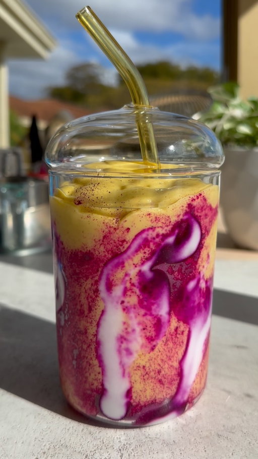 Pink pitaya and mango smoothie anyone ?
Super easy to make add to your blender 1 cup milk of choice with 2 cups of frozen mango 🥭, 1 tablespoon maple syrup and 1 tablespoon chia seeds. Blend until smooth consistency.
glaze your glass with yoghurt and pink pitaya and pour blended mango smoothie and enjoy! 
.
.
#mango #mangosmoothie #smoothie #smoothies #smoothierecipes #smoothierecipe #easyrecipeideas #healthysnackideas #smoothiesofinstagram #mangolover