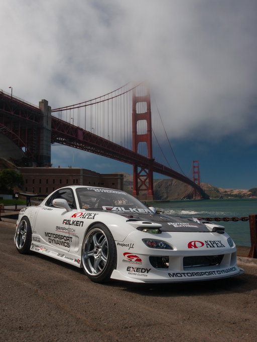 I always loved this version of @cw_calvinwan Calvin Wan’s FD3S RX7 Turbo. After enlisting the help of @gtrchung Henry Chung at Motorsport Dynamics, Calvin put together one of my favorite FDs with automotive style that still looks good 20 years after he originally built it. 

This FD had so much presence on the street, especially with those SSR D5R wheels framed with Falken Azenis tires. What a baller - can’t believe C.Wan built a car like this in his twenties.

As Calvin drove the streets of San Francisco in the FD so I could take these photos (back in 2005 with my Canon 20D crop-sensor camera), I remember how nervous we were about getting pulled over by cops, because this fully caged competition car was definitely not legal for driving on the street. 

This car already attracts so much attention visually - but the signature wind-up of its rotary engine boosting with the Apex’i turbocharger (What a legendary sound!!!) definitely had heads turning too!

Man, I love this FD. Can’t wait to see it back on the racetrack.

#FalkenTire #FalkenTires #TeamCanon #Canon20D #FD3S #MazdaRX7 #MazdaRX7FD #FD3Snation #FormulaDrift #rx7fd3s #rx7fd