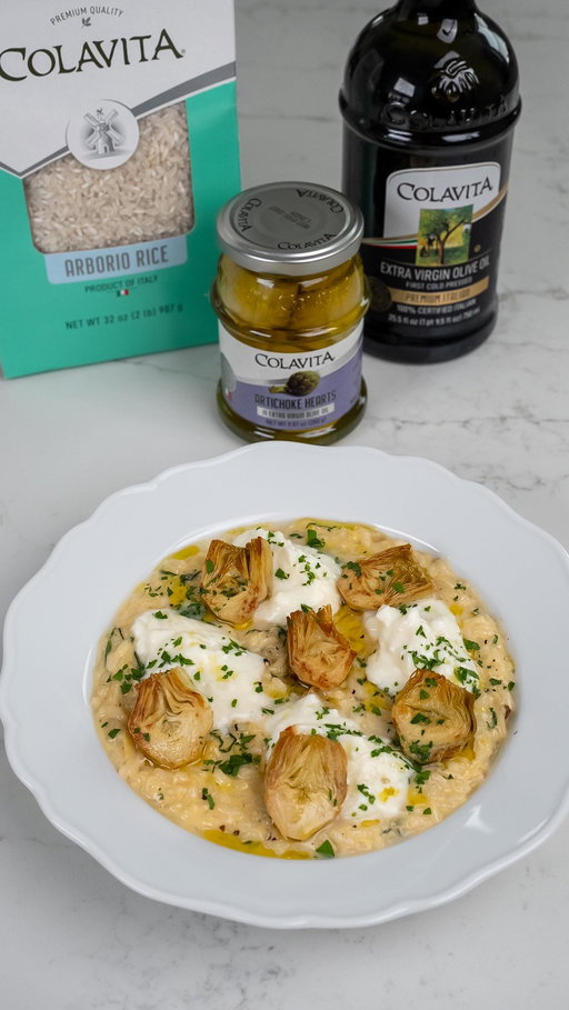 Artichoke & Burrata Risotto

Artichokes are one of my favorite ingredients to cook with, they pair beautifully with both dairy and meat dishes. The moment I saw these @colavitausa Artichoke Hearts in Extra Virgin Olive Oil, I knew they’d be perfect. They make a gorgeous topping for risotto while also adding depth and a satisfying bite.

#ad #colavitapartner #colavita #itstartswithcolavita 

Ingredients:
For the risotto:
1-2 shallots, finely chopped
2 cloves garlic, peeled
4 tbsp Colavita Extra Virgin Olive Oil, divided
2 tbsp unsalted butter
1 cup Colavita Arborio Rice
¼ cup dry white wine, such as Chardonnay
3-4 cups vegetable broth (see Notes)
2 jars (9.87 oz each) Colavita Artichoke Hearts in Extra Virgin Olive Oil, halved
About 1/2 cup grated Parmigiano Reggiano, plus extra for garnish
Fine sea salt, to taste
½ tsp freshly ground black pepper (optional)
Zest of 1 lemon
8 basil leaves, chopped just before adding

For serving:
2 tbsp fresh parsley, chopped
2 burrata, torn
Drizzle of Colavita Extra Virgin Olive Oil, optional
Freshly ground black pepper, to taste

Instructions in the comments
