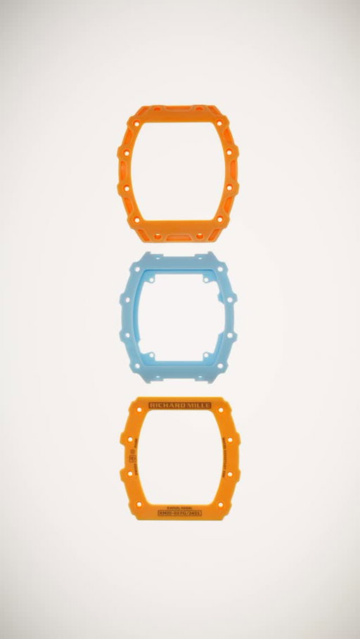 Framed by salmon Quartz TPT® enclosing a caseband in blue Quartz TPT®, the RM 35-03 Automatic Rafael Nadal reveals a fresh new look, infused with Richard Mille’s recent chromatic explorations.
Beneath its vibrant summer tones, the RM 35-03 remains a testament to the brand’s constant drive for reinvention — reinterpreting its collections with ever-greater boldness, and showcasing its unique blend of technical mastery and aesthetic innovation.

🎥 @milledollars