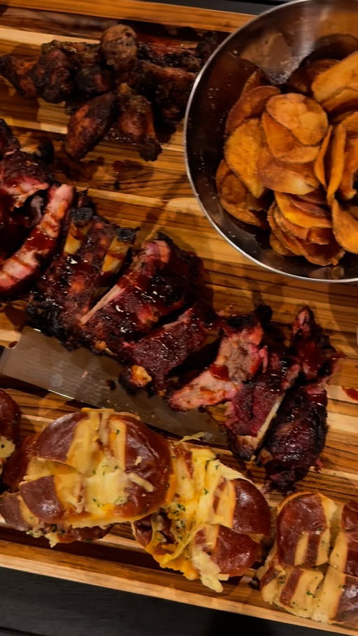 Gameday wings, ribs, and pretzel cheesy bread on the back patio #vlog #dayinthelife #cookingvlog #explorepage #outdoorcooking #lifestylevlog #traeger