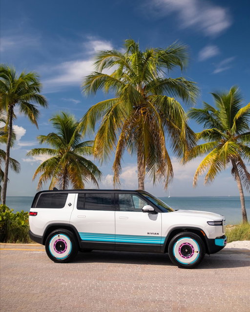 To celebrate the grand opening of our new space in Brickell, we’ve custom-designed a Tri-Motor R1S that’s as unique as Miami itself.

Inspired by the city’s unmistakable energy and style, this custom R1S aims to be a tribute to Miami and its rightful place in pop culture. The vehicle’s vibrant teal and pink color palette pays homage to the 1980s, while special details like blue side stripes and pink tow hooks and headrest inserts nod to its Art Deco influences. The result is a design that captures the spirit of our brand — celebrating creativity and nostalgia in a way that feels fresh but familiar and 100% Rivian.

This playful spirit is part of our DNA. We love experimenting with color, drawing from the natural world, and designing spaces that connect people to our vehicles.