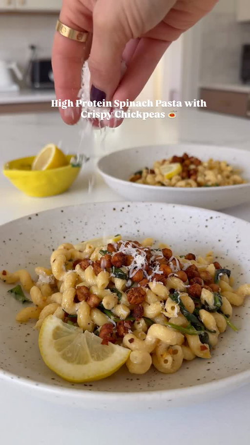 High Protein Spinach Pasta with Crispy Chickpeas 😍 
I love Banza pasta for a quick, protein- and fiber-packed meal — it’s such an easy way to make dinner feel nourishing while still coming together fast. #banzapartner One serving of Banza has 8g of fiber and 20g of protein, so it’s a staple in my pantry.

Ingredients:
1/2 lb Banza pasta
2–3 garlic cloves, minced
1 tbsp butter
2 tbsp olive oil
Juice of 1 lemon
1/2 cup heavy cream
1/2 cup grated Parmesan
1/4 cup broth (see notes)
1 cup spinach
Salt and pepper to taste
Red pepper flakes
Parsley for garnish

Directions:
Bring a pot (8 cups of water) to a boil, add salt, then pasta, and stir. Reduce the heat to a simmer. Reduce the heat to a simmer, stirring frequently, and cook for the recommended time or until al dente (about 6 minutes) expecting some foaming. Once done, drain the pasta and rinse it with cold water to remove the foam. Set aside. 
In a pan over medium-high heat, add the butter and olive oil. Add in garlic and sauté for a couple of minutes. Pour in the heavy cream and stir in the Parmesan cheese, lemon juice, salt, and pepper to taste. Let the mixture simmer and thicken for about 3–5 minutes.

Add the cooked pasta to the pan and toss everything together. For a creamier sauce, gradually add the broth, a little at a time. Finish with extra Parmesan, salt, and pepper to taste. Add in crispy chickpeas and garnish with parsley.
#glutenfree #pastanight #wholefoods #realfood #dallas #dfw #glutenfreerecipes #highprotein #easymeals