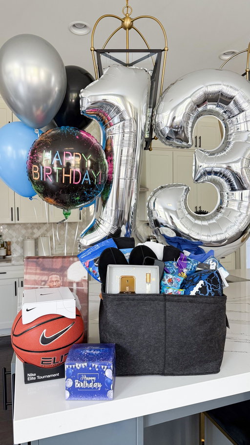 Grayson turned 13. Has a girlfriend. I’m unwell.

But he’s the sweetest kid, so of course he got a birthday basket loaded up with everything a new teenager thinks he needs—Nike everything, cologne so he smells nice for said girlfriend😭, and enough snacks to feed a small army (aka one teen boy).

I’m not okay… but he deserves every bit of this celebration.

#BirthdayBasket #teengiftideas #giftforteen #HomeWithKids #DIYGiftBasket #TeenLife #NikeStyle #CelebratingAtHome #designingmemories #familystyle