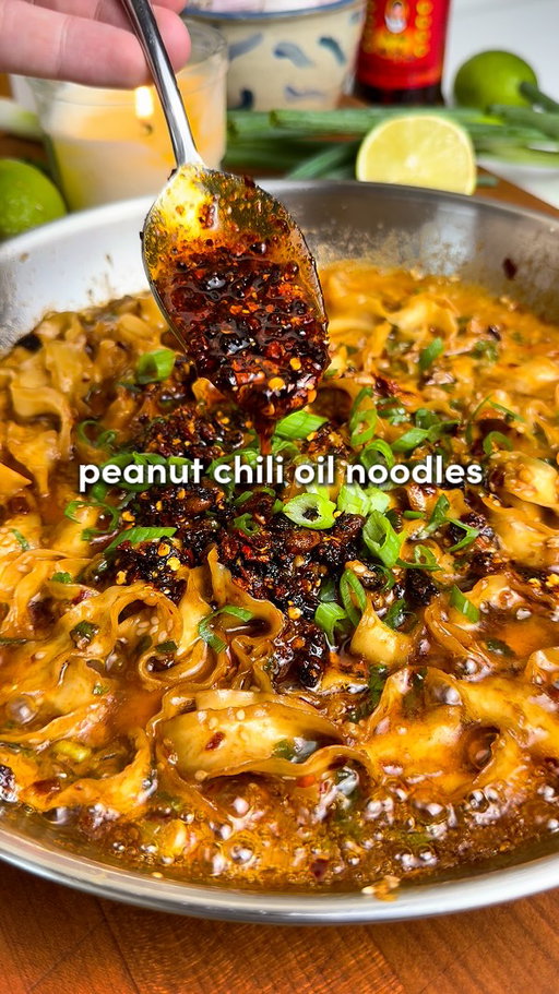 5-Minute Peanut Chili Noodles 🔥

Comment “Recipe” and I’ll send you the full recipe card for free!!

As simple as it gets, as flavorful as it gets: sweet, savory, and just the right spice.

Protein tip: Best served with chicken, shrimp, or tofu 🫡

Ingredients:
-9 oz (250 g) hand-cut thick noodles (or any noodles you like)
-1.5 tbsp peanut butter
-1 tsp chili flakes (optional)
-1/3 cup fresh green onion, sliced
-2 tsp sesame seeds
-5 garlic cloves, minced
-1 tbsp white sugar (optional, but balances the heat)
-1 tbsp chili crisp (+ 2 more tbsp extra for garnish) 
-1 tbsp rice vinegar
-2 tbsp dark soy sauce
-1/3 cup neutral oil (I use avocado)
-3 tbsp reserved pasta water (optional)
-More sliced green onion, for garnish
-Fresh lime wedges, for garnish

I recommend “Lao Gan Ma Spicy Chili Crisp”

Instructions:
1. Bring a  pot of salted water to a boil and cook your noodles according to package instructions. Undercook them by about 30 seconds because they’ll finish in the sauce. Save some pasta water (!!), then drain and rinse the noodles under cold water so they don’t stick together like clingy exes.
2. In a cold pan (no heat yet), add: peanut butter, chili flakes, green onion, sesame seeds, garlic, sugar, 1 tbsp chili crisp, rice vinegar, and dark soy sauce.
3. Heat 1/3 cup neutral oil until it’s really hot (like “sizzle your eyebrows off” hot), then carefully pour it over the cold ingredients in the pan. Watch the magic happen. Stir it all together.
4. Toss in your noodles and coat them in the sauce. If you want them extra silky, turn on the heat to medium-low, splash in 2–3 tbsp of the reserved noodle water and thoroughly mix together.
5. Turn off the heat, top with more green onion, extra chili crisp, and lime wedges if you’re fancy.