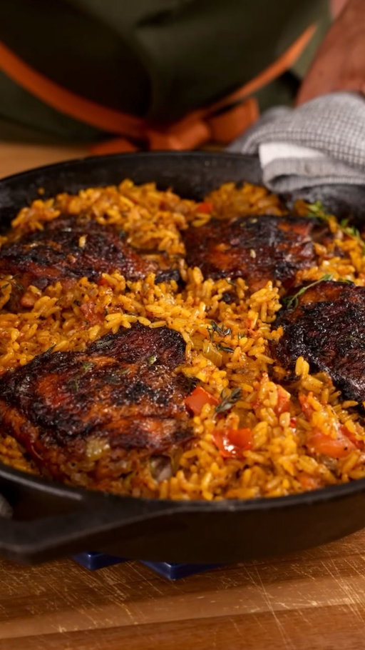 One-Pot Blackened Chicken with Coconut Turmeric Rice. Busy week ahead? This meal’s for you. Juicy, spiced chicken + fluffy rice cooked in coconut milk and packed with flavor all in one pan. Full recipe below! 

Ingredients
For the Chicken:
1 ½ lbs chicken thighs (about 4–5 pieces)
¼ tsp cayenne pepper
1 tbsp garlic powder
1 tsp ground cumin
½ tbsp chili powder
1 tbsp smoked paprika
2 tbsp tomato chicken bouillon
1 tsp salt
Leaves from 3 sprigs of thyme
1 tbsp olive oil

For the Rice:
1 ½ cups long grain parboiled rice, rinsed
5 garlic cloves, minced
1 tbsp grated ginger
1 small onion, chopped
2 roma tomatoes, diced
3 sprigs of thyme (whole)
2 cups coconut milk
1 cup chicken stock
1 tbsp garlic powder
½ tbsp tomato chicken bouillon
1 ½ tsp turmeric powder
Salt to taste

Instructions
1. In a bowl, combine cayenne, garlic powder, smoked paprika, cumin, chili powder, tomato bouillon, salt, and thyme leaves.Drizzle with 1 tbsp of olive oil. Rub the mixture all over the chicken thighs until well coated.
2. Heat 1 tbsp olive oil in a large skillet over medium-high heat. Add the chicken thighs and sear for 3–4 minutes per side until browned. Remove and set aside.
 3.Lower the heat to medium. In the same pan, add the onion, garlic, and ginger. Cook for 2–3 minutes until fragrant and translucent.
4.Stir in the diced tomatoes and cook down for 3–4 minutes.
 5.Add the rinsed rice to the pan. Stir in garlic powder, turmeric, tomato bouillon, and salt to taste. Toast the rice with the aromatics for 1–2 minutes.
 6.Pour in the coconut milk and chicken stock. Stir well to combine. Add 3 whole sprigs of thyme.
7.Return the chicken thighs to the pan, placing them on top of the rice. Cover and bake at 350 for 45 minutes. 
8.Fluff the rice and serve. :)