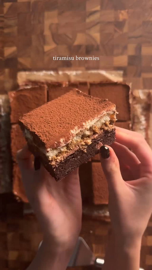 tiramisu brownies
brownies:
2 eggs
1/2 cup (42g) cocoa powder
1/2 tsp (3g) each salt and baking powder
1 1/2 tsp (6g) vanilla
1/2 cup (113g) unsalted butter (melted)
1 cup (200g) sugar
3/4 cup (90g) flour
2 tsp (4g) espresso powder
1/2 cup chocolate chips
*mix together eggs, cocoa powder, salt, baking powder, instant espresso, and vanilla. in a separate bowl cream butter and sugar, then microwave gradually (15 sec at a time) until sugar dissolves and is shiny. combine the egg and butter mixtures well, then add flour and mix gently, do not overmix. add chocolate chips and fold until combined. pour into a 9x9 pan and bake at 350 for 28-30 min.

mocha coffee ganache
1/2 cup (85g) chocolate (I used bittersweet)
1 tsp (2g) espresso powder in 3 tbsp (45g) hot water
1/4 cup (60g) heavy cream
*finely chop the chocolate. set this in a bowl. in a smaller bowl, microwave the heavy cream in the microwave slowly (20 sec increments). pour the hot heavy cream into the chopped chocolate and add in the espresso. mix well until smooth, and pour on top of semi cooled brownie. set in the fridge for an hour before adding the lady fingers. 

ladyfingers in espresso
16 ladyfingers soaked in 2 tsp (4g) espresso powder dissolved in 6 tbsp (90g) hot water
*gently and quickly dip the lady fingers in the espresso, making sure to get both sides and place on the cooled blondie/ganache.

mascarpone cream
1 cup (225g) mascarpone
1/2 cup (120g) whipping cream
1/2 cup (60g) powdered sugar
1/2 tsp (2g) vanilla
whip the mascarpone and then add the whipping cream and vanilla. mix until combined and then add the powdered sugar. Layer it on top of the lady fingers. cocoa powder for dusting! #tiramisu #brownies #baking #recipe