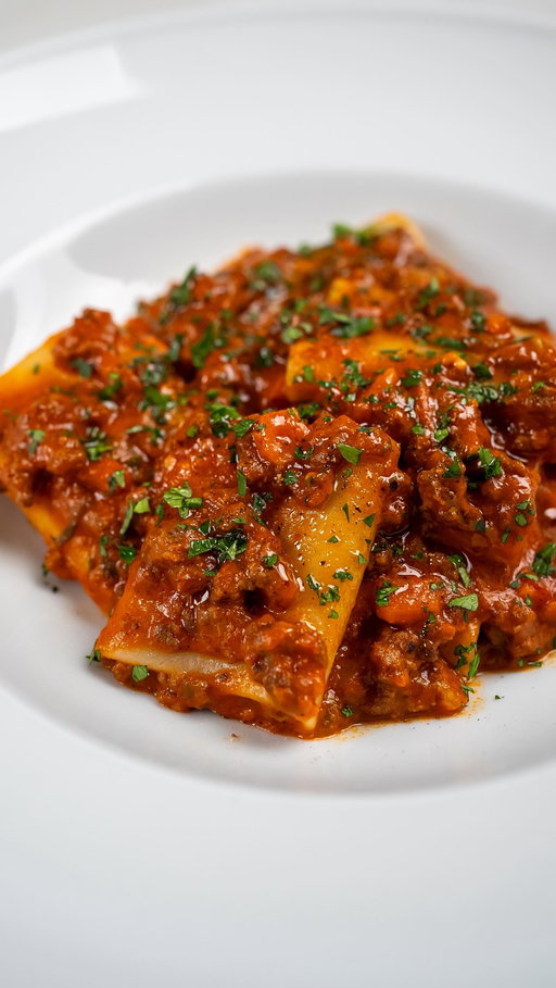 Gochujang Bolognese Pasta

A little twist on one of my favorite sauces. Ground beef Bolognese is always high on my list, but I like to play with the base. Here, instead of double-concentrated tomato paste, I used gochujang, and the flavor was next level - spicy, rich, and bold. I tossed it with paccheri, the big tubular pasta that’s perfect for catching all that sauce.

Find the full recipe on my website (link in bio)!

#pastanight #bolognese #italianamerican #americanfood #weeknightdinner #foodiefavorites #easydinnerideas #groundbeefrecipes #newyorkfoodie 

Bolognese pasta
Spicy pasta
Easy pasta dinner
Weeknight pasta
Ground beef pasta