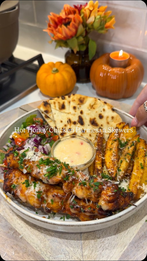HOT HONEY GARLIC PARMESAN CHICKEN SKEWERS

I have over 800 searchable recipe cards available on my app now, and over 100 meal plans, including shopping lists & all the written recipe cards.

Follow the link in my bio or on my story to sign up, use code FIRSTMONTH to get your first month for less than £1.50 

Follow @kimberlys_journeyy for more recipes like this⤵️

For 2 portions:
For the chicken:
- 300g chicken breast 
- 1 tsp chicken seasoning, onion granules/powder, paprika & parsley 
- 1tbsp honey
- 10g parmesan 

For the potatoes:
- 400g potatoes 
- Tsp smoked paprika, aromat, garlic granules & oregano 
- Tbsp hot honey 
- Tbsp Parmesan 

Hot honey mayo:
- 4tbsp light mayo 
- 2tbsp hot honey 
- 2tbsp sweet chilli 

Cut your potatoes into chips, then add these to water. Boil for 4 minutes, then drain, pat dry and add to your aifryer basket with the seasonings. Cook for 20 minutes and finish with the honey, Parmesan and fresh parsley.

For the chicken cut into thin even size strips (this helps it cook more evenly) then combine everything in a bowl leave the chicken to marinade for 10/15 minutes. 

Once you’re ready thread the chicken onto skewers, I cooked mine in my airfryer, I did them at 190 for 12 minutes. Brush over some of the honey mayonnaise once cooked and sprinkle over the parmesan & parsley.