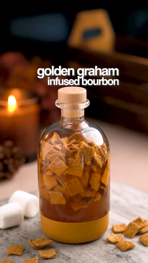 Are Golden Grahams a top 10 cereal? I really think they’re slept on, and they make a damn good bourbon infuser! 

🥣 GOLDEN GRAHAM INFUSED BOURBON 🥣
- 1 cup of Golden Grahams cereal
- 1 cup of bourbon
- Let infuse for 12+ hours

🏕️ S’MORES OLD FASHIONED 🏕️
- 2oz Golden Graham infused bourbon
- 1/2oz toasted marshmallow syrup
- 2 dashes chocolate bitters 

In a sealable container, combine equal parts Golden Grahams and bourbon. Let that infuse for at least 12 hours. Then combine infused bourbon, marshmallow syrup and chocolate bitters in a mixing glass. Add ice and stir well. Strain into a rocks glass. 

21+ to enjoy 🥃

#goldengrahams #smores #smoresoldfashioned #oldfashioned #bourbon #infusedbourbon #cocktail #cocktails #cereal
