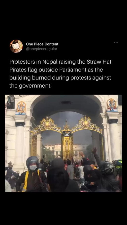 One Piece is one of the most impactful anime in the history of mankind, and this iconic picture will go down in anime history.

Things that should be happening later in the One Piece world are already happening in our own world. In Nepal, protesters raised the Straw Hat Pirates’ flag in front of Parliament as the building burned during demonstrations against the government.

The choice of the Straw Hat Pirates’ flag is no coincidence — in One Piece it represents freedom, rebellion, and the courage to stand against corrupt power. By raising Luffy’s Jolly Roger, Nepali protesters sent a powerful message that their struggle mirrors the themes of the anime itself, turning a work of fiction into a real-world symbol of resistance and defiance against oppression.