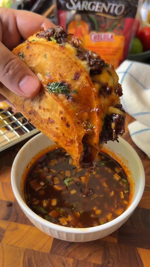 #sargentopartner Not gonna lie…these Stacked Birria Quesa-dillas are a cheese pull dream!😮‍💨#ad 

They’re crispy, beefy, cheesy, and loaded with SO much flavor in every bite from the Sargento® Shredded Cheese with Cholula® Seasoning! Perfect for game day snacks, weekday meals, or anytime you just want to break the rules with quesadillas.🤤

👉 Make sure to save this and share with that friend who’d demolish these in seconds!

🌮 Stacked Birria Quesadillas 🌮 
Serves 12

Ingredients

3-4 lbs beef chuck roast 
8 dried guajillo chilies seeds + stems removed
3 dried ancho chilies seeds + stems removed
2-3 dried pasilla chilies (optional, for earthiness)
3 medium Roma tomatoes (halved)
1 medium white onion (quartered)
6 garlic cloves (peeled)
1 tsp cumin seeds
1 tsp dried oregano (Mexican if possible)
½ tsp ground cloves
2 bay leaves
1 stick cinnamon (or ½ tsp ground)
4 cups beef stock (or water)
2 tbsp apple cider vinegar
Salt + black pepper to taste
2 packages of Sargento® Shredded Cheese with Cholula® Seasoning
6” corn tortillas
Fresh cilantro + chopped onion + lime wedges (for serving)

Method:

Sear the beef: Cut chuck roast into large chunks, season with salt and pepper, and sear in oil in a Dutch oven until browned on all sides. Remove from the pot and set aside.

Sauté the aromatics: In the same pot, add the onion, garlic, chilies, and tomatoes. Cook until softened and lightly charred.

Make the chile paste: Blend the sautéed mixture with cumin, oregano, cloves, cinnamon, vinegar, and a cup of stock or chile soaking liquid until smooth. Strain for a silky sauce if desired.

Build the consommé: Return the chile paste to the pot and cook it down for a few minutes. Add the beef back in along with bay leaves and the remaining beef stock. Bring to a boil, then reduce to low and braise gently for 2.5–3 hours until the beef is fall-apart tender. Skim fat as it cooks, reserving some of the red oil on top for tortillas.

Shred and finish: Remove beef, shred it, and set aside for quesadillas. Strain the broth for a clean consommé, or leave rustic.

@sargentocheese 
@cholulahotsauce