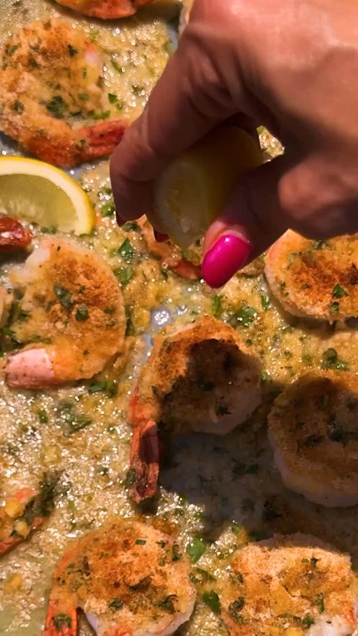 Here’s how to make @annafgass’s Sheet-Pan Shrimp Oreganata:

• ¼ cup unsalted butter
• 1½ pounds large tail-on shrimp (about 24), peeled and deveined
• ¼ cup plus 2 tablespoons extra-virgin olive oil, divided
• Kosher salt (such as Diamond Crystal) and pepper
• 1 lemon
• ¾ cup dried bread crumbs
• ¼ cup flat-leaf parsley leaves, finely chopped
• 2 garlic cloves, minced
• 1 tablespoon dried oregano
• ⅓ cup white wine

Heat the oven to 450 degrees and position a rack in the middle. Cut the butter into small knobs and spread on a 9-by-13-inch sheet pan; set aside.

While the oven heats, place the shrimp in a medium bowl along with ¼ cup olive oil, 1 teaspoon salt and ½ teaspoon pepper. Zest the lemon on top, quarter the lemon, then squeeze in about 2 tablespoons lemon juice (reserve the remaining lemon for later). Mix to combine, then set aside.

In another medium bowl, combine the bread crumbs, parsley, garlic, oregano, 1¼ teaspoons salt and 1¼ teaspoons pepper. Add the remaining 2 tablespoons of olive oil and mix with a fork to combine.

Set the sheet pan in the oven and heat just until the butter has melted, about 2 minutes. Carefully remove the hot baking sheet, setting it on a flat surface, then add the wine and swirl the pan to blend it with the butter.

Place the shrimp onto the hot pan in an even layer. Pour any remaining marinade over shrimp. Generously sprinkle the bread crumb mixture over each of the shrimp, allowing the excess to pool underneath as well.

Bake on the middle rack for about 6 minutes, until shrimp are pink and cooked through. Turn the oven to broil for 2 minutes to brown the bread crumbs. Remove from the oven and squeeze the juice from the remaining lemon wedges over the shrimp.

Enjoy the shrimp hot, spooning the pan juices and bread crumbs from the pan alongside.