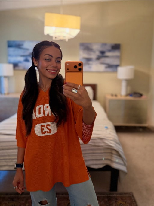 we’re matching! 🍊 #iphone17promax