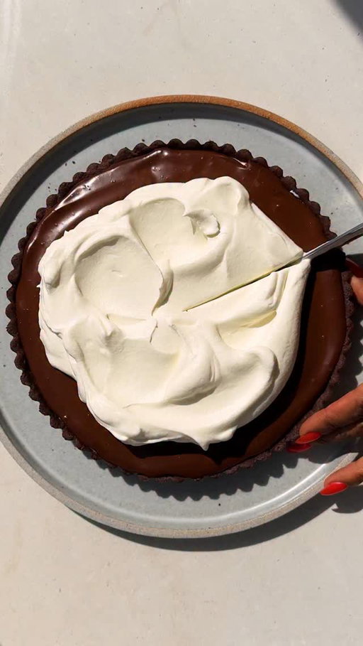 Imagine a peppermint patty, made huge and fancy enough for a dinner party. @yossyarefi’s Chocolate Mint Tart recipe is free for a limited time at the link in bio!