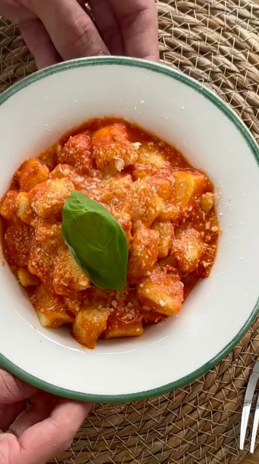 Flour, potatoes, maybe an egg! 🥔🍳 This gnocchi recipe is all about keeping it simple and satisfying✨ @chefmarco_nyc @giallozafferano

Ingredients:
4 cups red potatoes (1kg)
2⅓ cups all-purpose flour (300g)
2 optional eggs (1 whole, 1 Yolk)
Salt to taste

Usually Usually potatoes are boiled for gnocchi.
The main reason why I baked it is to keep the potato as dry as possible, water is big enemy.
The wetter they are, the more flour you need To use. More flour results in a gnocco harder at
the bite.
Eggs are not essential.
They help the dough coming together other then adding more nutritional value.
Wash the potatoes and bake it (or boil it) for about 40mins or until the knife proof goes well. ( If
the knife comes in and out smoothly it mean there are cooked enough.)
Add flour onto the counter and mash the potatoes on it.
Make a well a the center adding 1 whole egg and an egg yolk at the center.
Add salt and crack the eggs.
Add flour and knead until smooth and uniform, the faster the better.
Cut some pasta stripes and roll it in long cylindrical shapes.
Cut the gnocchi however size you prefer, I usually go for 2/3cm.
Cooking gnocchi is extremely easy.
Add it to boiling salted water and mix right away to prevent sticking, after a few seconds they’ll
be sticking-proof.
When they stat floating take the one on the surface and add it to the sauce you chose.

#giallozafferano #gz #homemade #gnocchi #yummy #foodvibes