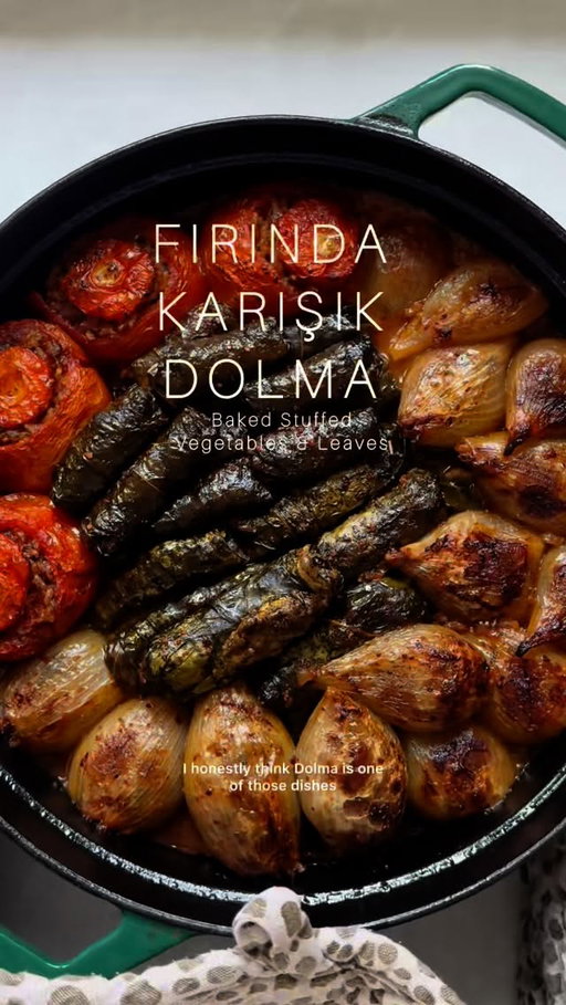 Fırında Karışık Dolma (Baked Stuffed Vegetables & Leaves). Full recipe on my blog and in Meliz’s Kitchen. 

Serves 6–8
4 large onions
6 ripe tomatoes
400g (5½ oz) Swiss / rainbow chard (with stalks on) 
50 g (1¾ oz) fresh flat leaf parsley
3 tbsp olive oil
1 tsp pul biber
¼ tsp paprika
½ tsp ground cinnamon
½ tsp ground cumin
1 tsp salt
1 tsp coarse black pepper
2 tbsp Turkish sweet red pepper paste (tatlı biber salçası)
3 tbsp tomato purée
250 g (9 oz) short grain rice 
1 tbsp dried mint
1 tbsp pomegranate molasses
4 tbsp fresh lemon juice
4 tbsp extra virgin olive oil
50 g (1¾ oz) pine nuts
16 vine leaves
1 chicken or vegetable stock cube
400 ml (14 fl oz) boiling water
200 ml (7 fl oz) cold water
30 g (1 oz) unsalted butter
¼ tsp pul biber

#melizcooks #MelizsKitchen #dolma #sarma #vegetables #chard #vineleaves #rice #tomatoes #onions #slowcooking #lovelanguage #foodislove #PleaseMakeIt