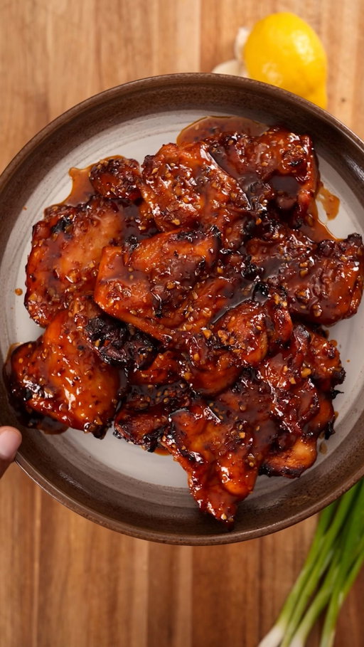 What’s For Dinner Tonight? Ep. 3 Sticky, sweet, and a little spicy Maple Soy Air Fryer Chicken Thighs for dinner tonight! 

INGREDIENTS 
Chicken & Marinade
2 lb boneless, skinless chicken thighs
1 lemon, zested
⅛ cup soy sauce
¼ cup maple syrup
1 tbsp garlic powder
1 tbsp smoked paprika

Glaze 
2 tbsp butter
4 cloves garlic, minced
½ cup maple syrup
⅓ cup soy sauce
2 tbsp rice vinegar
3 tsp Momofuku chili oil
1 tsp cornstarch + 2 tbsp water (slurry)

INSTRUCTIONS
1.In a bowl add chicken thighs and season with  soy sauce, maple syrup, lemon zest, garlic powder, and smoked paprika, coat well. 
2.Preheat the air fryer to 400°F. Place thighs in a single layer and cook for 15 minutes, flipping halfway, until golden and cooked through (165°F internal temp).
3.Make glaze: In a saucepan, melt butter. Add garlic and cook until fragrant. Stir in maple syrup, soy, vinegar, and chili. Simmer for 3–4 minutes. Stir in slurry and cook until sticky and glossy.
4.Baste & finish: Add cooked chicken thighs to the glaze, toss to coat, 
5.Serve: Drizzle extra glaze over the chicken serve over rice and veggies and enjoy!
