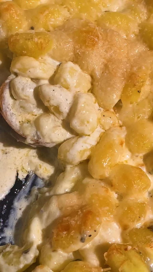 Here’s how to make @itsalislagle’s Gnocchi Gratin:

• 2 cups (1 pint) heavy cream
• 2 garlic cloves, finely grated
• 2 packed tablespoons finely chopped sage leaves (or 1 tablespoon dried)
• ¼ teaspoon finely grated nutmeg (optional)
• Salt and black pepper
• 2 (16- to 18-ounce) packages potato gnocchi
• 2 ounces (½ cup) coarsely grated Gruyere
• 1¾ ounces (½ cup) finely grated Parmesan

Heat the oven to 375 degrees. In a 9-by-13-inch baking dish, stir together the cream, garlic, sage and nutmeg (if using) and season generously with salt and pepper. Stir in the gnocchi and spread into an even layer (it’s OK if the gnocchi aren’t completely covered in cream). Sprinkle with the Gruyere and Parmesan. Bake until the top is browned and crisp, 30 to 35 minutes. Let rest for a few minutes before serving.