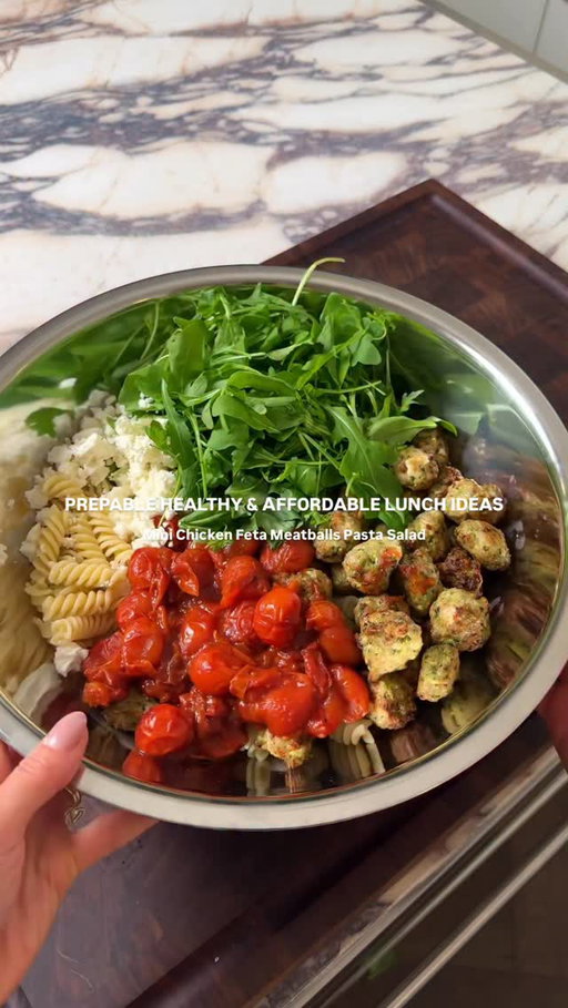Healthy affordable high protein prepable lunches 👇🏼

Ad Mini Chicken Feta Meatballs with Blistered Cherry Tomato Pasta Salad 36g protein at only £2 per portion using a range of ingredients from the remarksable range from M&S. Ideal for students, lunch boxes & prep. This will hold for 3 days. 

Serves 5, 475 kcal & 36 g protein

Ingredients
500g M&S Oakham Gold 5% chicken mince
100g feta (60g for sauce, 40g in meatballs)
350g dried pasta
350g cherry tomatoes, whole
1 courgette, grated & well squeezed 
3 small garlic cloves
Zest of 1 lemon (plus juice for finishing)
15g fresh basil, chopped
60g rocket
1 tbsp balsamic vinegar
1/2 red onion finely diced 
1 tbsp tomato puree
1 tsp olive oil, salt & black pepper

Blitz the courgette, basil, garlic and lemon zest in a food processor until finely chopped, then mix this into the chicken mince with about half the feta crumbled, salt and pepper to form the mixture. Roll into small meatballs and arrange on a lined tray. Bake with the grill on at 190°C for 15–20 minutes, flipping halfway so they brown evenly. You can also air fry at 190°C for 14–16 minutes, shaking once to colour all sides.

While the meatballs cook, heat a pan with a teaspoon of olive oil, add the cherry tomatoes and a few lightly smashed garlic cloves, and cook over medium–high heat for 8–10 minutes until they blister and burst. Add in 1 heaped tbsp tomato puree, a tablespoon of balsamic vinegar, salt and pepper and let it caramelise for about 3-5 minutes before loosening with a splash of water to make saucy again (it needs to coat the pasta)

Cook the pasta in boiling salted water for 10–12 minutes until tender, drain and reserve some of the cooking water. Toss the pasta through the tomato mixture with the cooked meatballs, adding splashes of the reserved water until everything is glossy and coated. Off the heat, fold in rocket, freshly torn basil leaves and finely diced red onion. Scatter the remaining feta over the top just before serving or boxing up, then finish with a squeeze of lemon and season to taste. 

#healthyrecipes #healthyfood #easyrecipes