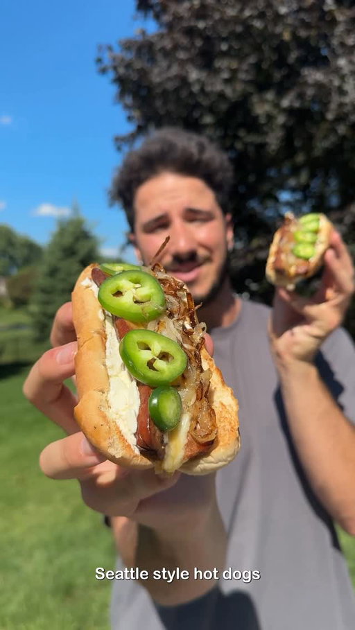 Seattle-style hot dogs with bold @Tillamook Cheese and rich Tillamook Cream Cheese Spread, just in time for tailgate season. Would you consider this a sandwich? #TillamookPartner