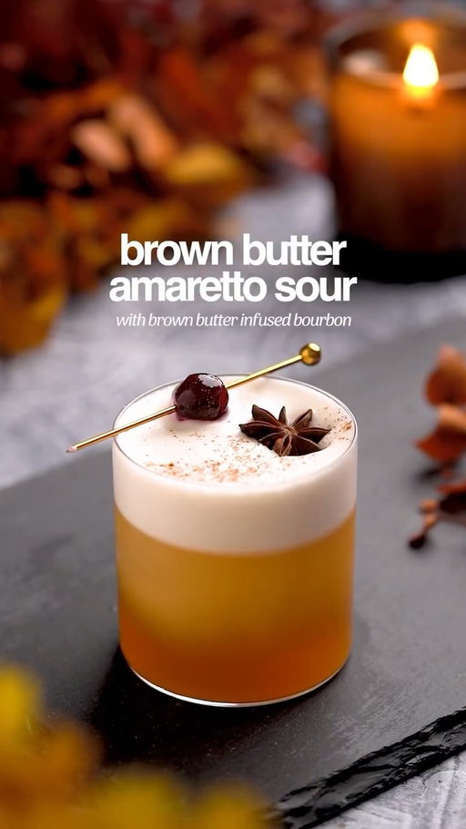 Top 5 prettiest and most delicious drinks I’ve ever made, do doubt in my mind about it 💯

🥃 BROWN BUTTER AMARETTO SOUR 🥃
- 1oz brown butter infused bourbon
- 1.5oz amaretto 
- 1oz cinnamon syrup
- 1oz lemon juice 
- 1 egg white

In a cocktail shaker, combine brown butter infused bourbon, amaretto, cinnamon syrup, freshly squeezed lemon juice and an egg white. Reverse shake by shaking with ice, then straining out the ice and shaking again. Strain into a glass and garnish. 

🧈 BROWN BUTTER INFUSED BOURBON 🧈
*see previous video*
Melt down one stick of unsalted butter until it bubbles and browns. Remove from heat and let cool, then add to a sealable container. Mix in 2 cups of bourbon and shake well to combine. Let this sit for about an hour then store in the fridge overnight. Strain out the bourbon using paper towels or a coffee filter. 

21+ to enjoy 🥃

#brownbutter #bourbon #amarettosour #amaretto #bourbonlover #bourboncocktails #cocktail #cocktails #fall #fallvibes #fallcocktails