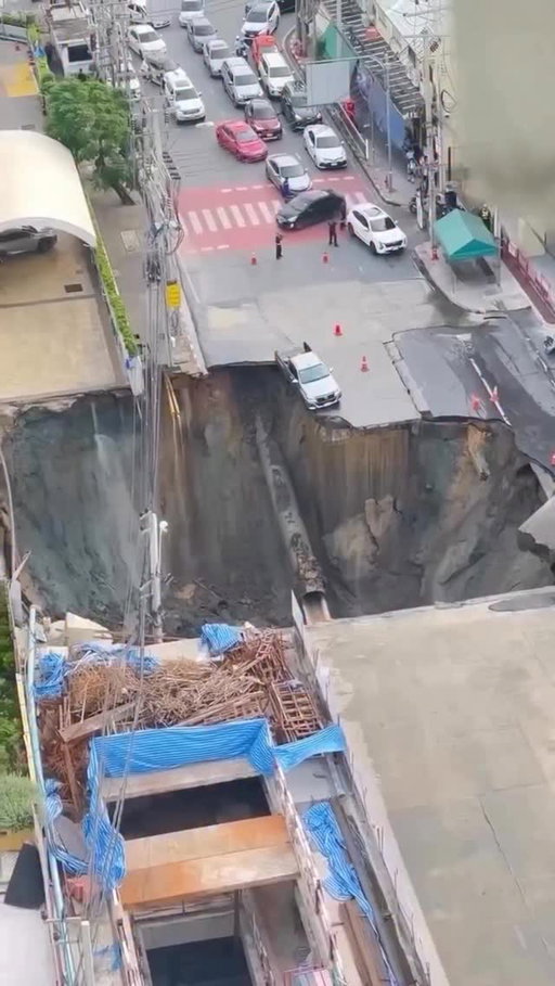 This shocking footage shows the moment an under-construction metro tunnel collapsed in Bangkok at around 7am local time on Wednesday morning. It’s understood that no one was injured in the incident and that the cars which fell into the hole were empty. 

The tunnel was being built as part of the extension to Bangkok Mass Rapid Transit’s Purple Line. The city’s Governor Chadchart Sittipunt told reporters that the collapse appeared to have been caused by a water leak from a burst pipe inside the tunnel. 

#architecturelovers #architecture #TheB1M #construction #engineering #bangkok #thailand #metro #cities #infrastructure #urban #rail #fail #tunnel #subway #collapse