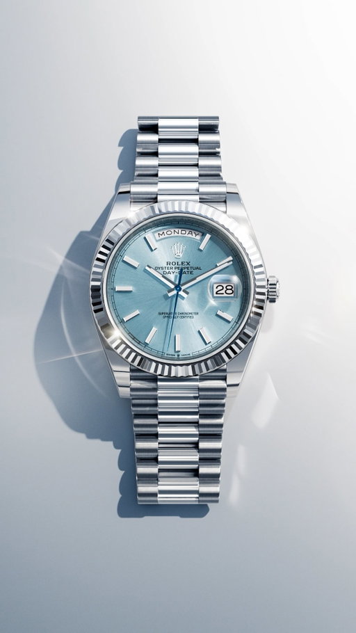 The Day-Date. It says achievement. Its ice-blue dial says platinum. This exclusive colour is the unmistakable sign that a Rolex is crafted from the noblest of precious metals. Distinctive fluted bezel. Day of the week displayed in full, available in 26 languages. President bracelet with ceramic inserts for increased resistance and comfort. 40mm, calibre 3255.
#Rolex #DayDate