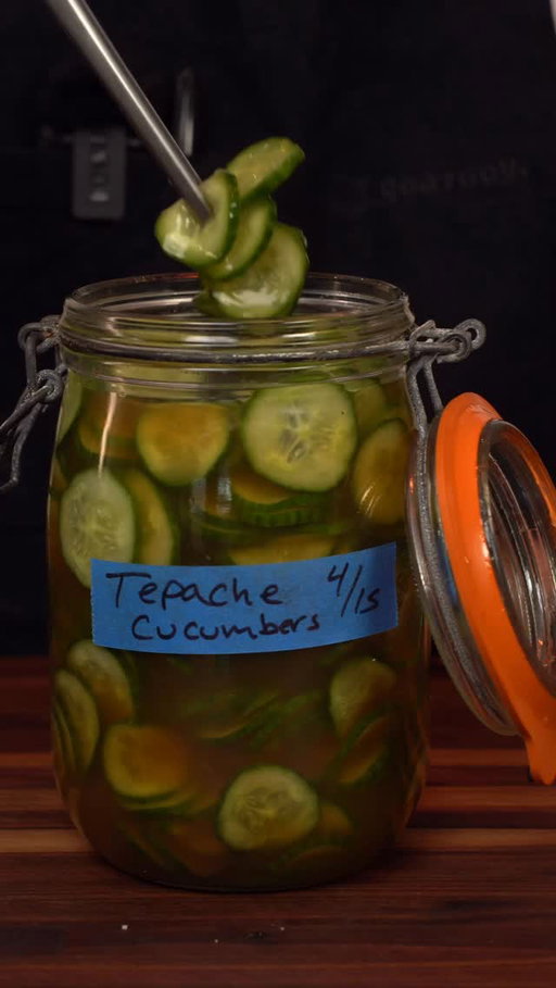 “Tepache” pickled cucumbers. Did this recipe for a dinner back in March and they were a hit. So easy to make! Recipe below 👇🏽 

“TEPACHE” PICKLED CUCUMBER
YIELD: 1 QT

750g Persian cucumber, sliced thin on a mandolin
355g pineapple juice
250g white vinegar
95g piloncillo
20g Mexican cinnamon
10g sea salt (I used sal de Colima)
1g black peppercorns, whole
1g star anise
1g chile de arbol
1g bay leaves, dry 
.5g coriander seeds, whole

Sprinkle the salt over the cucumbers and allow to sit at room temp while you prepare the pickling liquid. Place the rest of the ingredients in an appropriately sized pot and bring to a boil and stir to incorporate the piloncillo. It needs to be dissolved. Remove from heat and steep until cooled. Strain and discard solids. Place cucumbers in an appropriately sized glass jar, pour picking liquid over the to cover. Store in the refrigerator overnight to pickle. Enjoy.