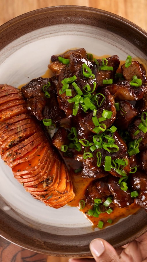 What’s for Dinner Tonight? Ep. 4 
Honey Sriracha Steak Bites with Hasselback Sweet Potatoes  The air fryer steak actually turned out juicy! Definitely adding this one into the weeknight dinner rotation ✨

INGREDIENTS 
Butter Mixture for Sweet Potatoes (all ingredients mixed except for salt ) 
1 stick (½ cup) unsalted butter, melted
5 garlic cloves, minced
2 tbsp fresh thyme leaves, chopped
1 tsp black pepper
Sea salt (for sprinkling after brushing)

Sweet Potatoes
4 medium sweet potatoes, washed
Steak Bites (Air Fryer)
1 ½ lb ribeye (or NY strip for leaner), cut into 1–1.5 inch cubes
2 tsp sea salt
2 tsp black pepper
1 tbsp olive oil
Honey Sriracha Sauce
3 tbsp butter
1 cup honey
⅓ cup sriracha
2 tbsp soy sauce

INSTRUCTIONS 
1.Place a sweet potato on a cutting board. : Optional you can Position two butter knives on either side (to stop the knife from cutting all the way through).
2.Slice thin, even cut across the potato, stopping just before the bottom so it fans out.
3.Brush generously with the melted butter mixture, making sure it seeps into the slices.
4.Sprinkle it with sea salt.
5.Roast at 425°F for 35–40 minutes, until tender inside and crisping on the edges.
6.in a small saucepan, melt butter.
7.Stir in honey, sriracha, and soy sauce.
8.Simmer for 2–3 minutes until slightly thickened and glossy.
9.Pat steak cubes dry. Toss with olive oil, salt, and pepper
10.Preheat the air fryer to 400°F.
11.Air fry in a single layer for 8-10 minutes, shaking halfway through, or  until desired doneness 
12.Toss steak bites immediately after air frying, saving extra sauce for drizzling. And enjoy with hassleback Roasted sweet potatoes.
