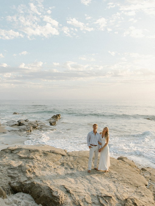 officially one year until I get to marry you!!!! @tuckerhaerle 🤍 

photos by the incredible @victoriaperezphoto 
makeup by @makeupbylindajoy 
dress is @runawaythelabel @revolve 

obsessing over all the photos from this shoot, we had so much fun. we went to Windensea for these, our favorite little beach in our favorite place 🐚✨ it was kind of a full circle moment because @victoriaperezphoto did a shoot with us 5 months after we started dating, and here we are taking our engagement pictures with her 🥹 

#engagementphotographers #engagementphotoshoot #engagements #bridalera @fairharbor #sandiego #couple #coupleshoot #wedding