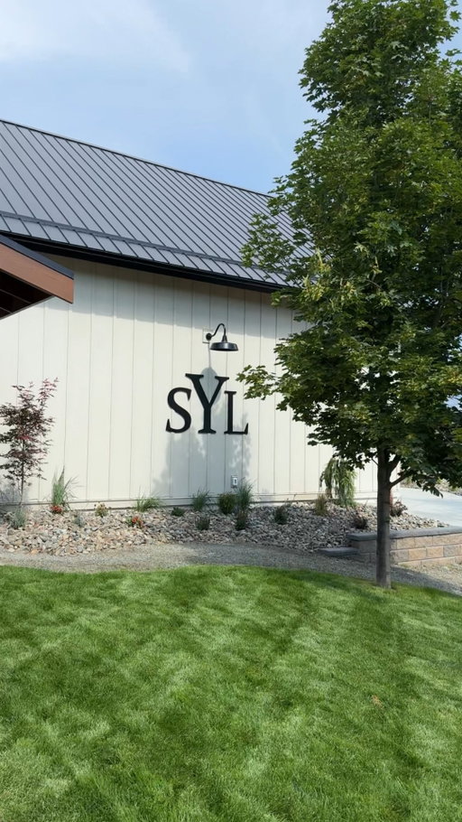 Your sign? Literally floating in ☁️🍷
Our tasting room has officially reopened... and she’s looking cute 👀 

Reservations are encouraged right now. Come sip with us! 

#SeeYaLaterRanch #SYLRSeason #OkanaganVibes #BCWine #OkanaganWine #BCWinery #HelloBC #ExploreBC