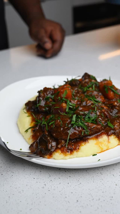 Beef Bourguignon
Rich, delicious, and comforting. A recipe you’ll come back to time and time again — especially as we head into the colder months. 🍷🥩
Full recipe below ⬇️

Recipe,

Ingredients
	•	2 lbs beef chuck, diced
	•	1 lb double-smoked bacon, chopped into lardons
	•	2 onions, julienned
	•	2–3 carrots, sliced
	•	2 tbsp tomato paste
	•	2 cups red wine
	•	3 cups beef stock
	•	2 sprigs rosemary
	•	3 sprigs thyme
	•	2 bay leaves
	•	1½ cups mushrooms, chopped
	•	1 cup pearl onions, blanched & peeled
	•	Salt & black pepper, to taste
	•	Oil, as needed

Method
	1.	Season beef with salt and pepper. Sear until browned, then remove.
	2.	Render bacon until crisp. Remove, keeping the fat.
	3.	Sauté onions and carrots in same pot. Add tomato paste and cook briefly.
	4.	Deglaze with red wine, then add beef stock. Return beef and bacon. Add rosemary, thyme, and bay leaves. Simmer.
	5.	Separately roast mushrooms and pearl onions in oil, salt, and pepper. Add them halfway through braise (about 1.5–2 hours).
	6.	Continue cooking until beef is tender and sauce is rich.

Serve hot — ideally over mashed potatoes

#easyrecipes #braisedbeef #torontochef