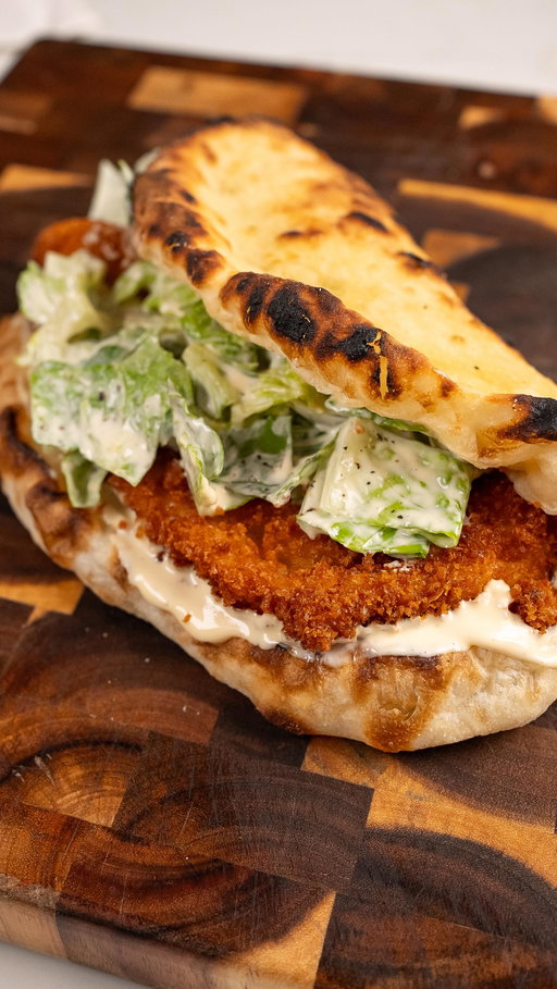 Crispy Chicken Caesar Pizza Sandwich

Caesar salad and crispy chicken is a combo that’s hard to beat. Stuff it all inside folded pizza dough and it goes to another level. I used the Caesar dressing as the base of the sandwich, and together it made a heavenly bite.

Full recipe on my website!

#chickensandwich #foodie #pizzalover #americanfood #easymeals 

crispy chicken sandwich
chicken caesar pizza
Easy recipe
Easy comfort food
American fusion food