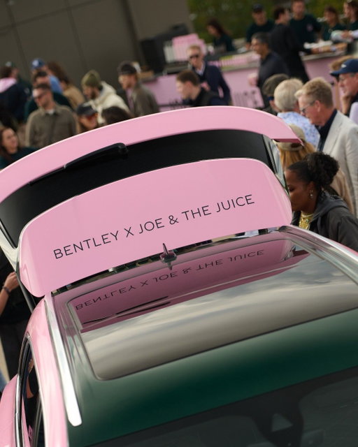 We have formally announced our partnership with Joe & the Juice. It's a celebration of the global intersection of cars, coffee, and conversation.

The two brands will travel together to cultural hotspots and high-end intimate events around the world, their followers sharing their love of meticulous craft and elevated taste.

Bentley's bespoke Mulliner division has designed and crafted an espresso module for the rear of its Bentayga luxury SUV. Clad in leather and featuring green panels with pink detailing, the installation slides out when the car is stationary.

The Bentayga's striking external livery contrasts Bentley Green with Joe & the Juice’s Signature Pink. Its insignia combines the icons of each brand: Bentley's winged-B, supporting Joe's coffee-drinker.

The partnership launched last weekend with a private cars and coffee meet at west London's classic car hub, Duke of London.

Evocatively celebrating the partnership, it was a morning for the senses. The aroma of fine espressos blended with a hubbub of conversation, as laughter harmonised with rumbling exhausts. Sharp juice blends, creative car design, and a stylish crowd completed the picture.

From Crewe to Copenhagen: Bentley x Joe & The Juice. 

Bentayga Extended Wheelbase (V8) WLTP drive cycle: fuel consumption, mpg (l/100km) – Combined 21.7 (13). Combined CO₂ emissions – 296 g/km. CO₂ class – G.

#bentleystories