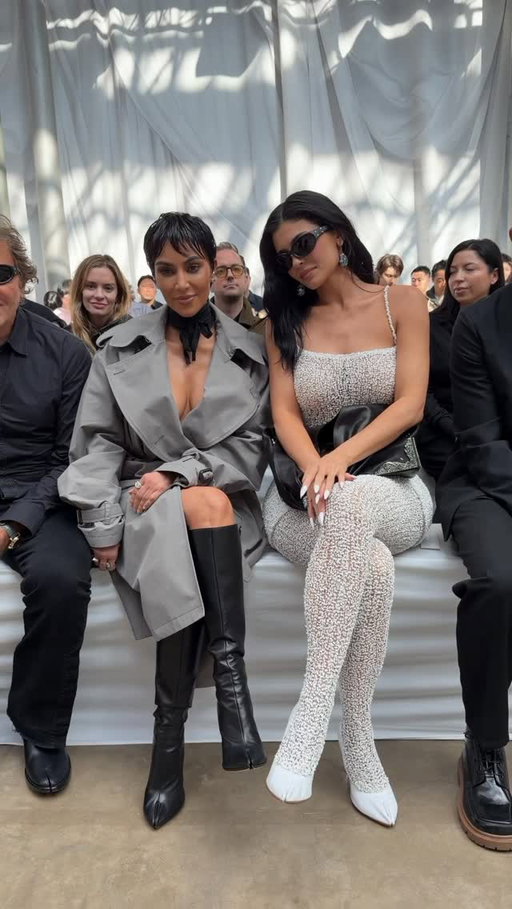 Sisters who @maisonmargiela together, stay together. @kimkardashian and @kyliejenner lined the front row of @glennmarten’s debut womenswear show this morning at #ParisFashionWeek. Video by @enzoply