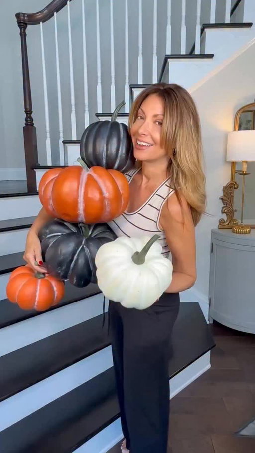 Falloween Entryway 🕯️🎃— the Simply Stunning Way.  Your entryway should tell a story the moment you walk in — and for fall, that story begins with layers.

I created this moody Falloween staircase using pieces from my Simply Stunning Harvest Collection, available now on QVC.com. My design philosophy is simple: layer, balance, repeat.

Start with lifelike pumpkins in mixed tones and sizes to create rhythm and flow. Add glowing flameless candles for warmth and depth. Weave in black maple leaves and autumn foliage to soften edges, then finish with statement accents — a cauldron, perched ravens, or details that make it your own.

You don’t need a large space to make a statement — it’s all in how you layer. Thoughtful mix, balance, and repetition bring big impact and seasonal warmth to any space — the Simply Stunning way. 🍂🖤

#SimplyStunningbyJanineGraff  #qvc #falloween  #entrywaydecor #halloweendecor