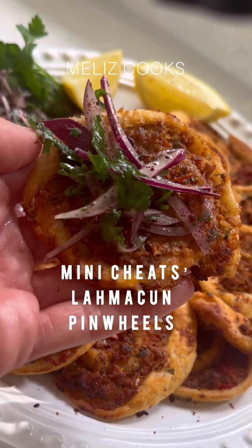 Resharing this from my “Meliz’s Cooks” twist series. My Mini Cheats’ Lahmacun Pinwheels are a quick and easy treat version of my lahmacun recipe on my blog, both recipes have been on there for years. Ingredients below, full method in the caption and on my blog (link in bio). I posted this a year ago and I’ve loved seeing the remakes! Please make it. 

Ingredients

1 small onion, peeled, roughly chopped
1 kapya biber / red romano or small red bell pepper, deseeded, roughly chopped
1 green çarliston (charleston) pepper or small 
green bell pepper, deseeded, roughly chopped
25g fresh flat leaf parsley, roughly chopped
2 large garlic cloves
200g lamb or beef mince
1 very large, ripe tomatoes, halved, fresh grated, skins discarded
1 tsp ground cumin
1 tsp paprika
2 tbsp tatlı biber salçası (Turkish
sweet (mild) red pepper paste)
1 tbsp olive oil
3/4 tsp fine sea salt
1/2 tsp coarse black pepper
1 x 320g puff pastry

For the salad:
1 Red onion, peeled and very finely sliced
25g (1oz) fresh flat leaf parsley
leaves, roughly chopped
1 tbsp sumac
1 tbsp extra virgin olive oil
1/4 tsp sea salt flakes

#lahmacun #puffpastry #easyrecipe #quickrecipe #melizcooks #simpletwists #dinner