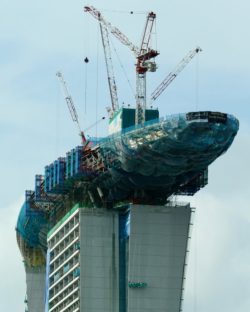 Incredible pictures of Singapore’s Marina Bay Sands under construction 🔥 See how architects and construction teams pulled off this jaw-dropping feat of engineering, and how they’re now expanding the hotel in our special video, now up on YT and TheB1M.com — links in our bio 🏗️

#architecturelovers #architecture #construction #engineering #singapore #design #skyscraper #hotel #asia #TheB1M #constructionsite #site #crane #cities