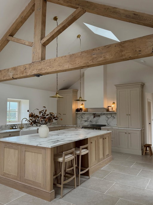 After + Before 😭 .. Saturday morning’s at the barn 🍂 thought I’d share some still images of this space because we just love it so much, slide to the very end to see some during and before. Tagged everything below 🤎 

paint colour @lick white 06 supreme matte 
kitchen @marklohankitchens 
tiles @quornstoneofficial lullington beige 
cooker @lofrauk 
hanging lights @neptunehomeofficial 
worktop (this is porcelain) 
vase @zarahome 
leaves @the_suffolk_nest 
bar stools @laredoute_uk 
sofa @ikeauk 
rug @industville 

some things may contain pr discount * 

#barnconversion #countrysideliving #barn #renovation #beforeandafter #kitchendesign #kitcheninspo #kitchen #home #homedesign