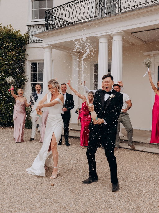 When it came to styling, Katie & Ethan ditched the muted palettes and went for unapologetic fun. Bold pinks and blacks injected energy and party vibes right from the start 🩷✨🍾 #LinkInBio Read about this fun, high-energy wedding at Rockbeare Manor filled with bold pink and black styling, seaside details, creative DIY ideas, and unforgettable party vibes!
.
⭐ Recommended Suppliers:⁠
Bridesmaid Dresses @rewrittenlondon
.
Suppliers:
Venue @rockbeare_manor_
Photographer @kirstypurkisphotography
Videographer @thecraigescape
Band @noblejacksmusic
Cake @jemmabakes
Hair @natalienicholsbridal
MUA @bysophietougher
.
.
.⁠
#PinkWeddingInspo #BlackTieWedding #LuxeWedding #FunWedding #PinkBridesmaids #WeddingDetails #WeddingIdeas #WeddingInspiration #WeddingTrends #WeddingSeason #YourDayYourWay #RockMyWedding