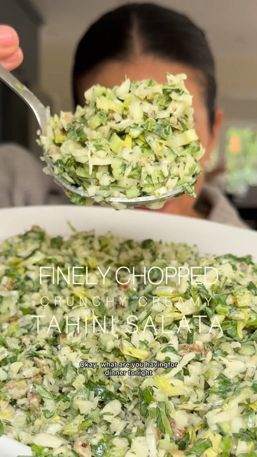 Ok, what are you having for (lunch) or dinner tonight because I REALLY think you should make this seriously moreish super crunchy, creamy, finely chopped tahini salata 💚🌿🥬🤍 The key is to chop EVERYTHING as finely as possible. The full recipe is on my blog and in the caption, and the method is on the reel - the drawing recipe makes a nice BIG BATCH (for 2-3 regular sized salads (feeding around 4 people each) so make ahead and store in the fridge for up to a week (take the dressing out of the fridge 30 mins before serving). You can also dress the salad and store in the fridge for up to 3 days and it won’t go soggy. 

Serves 6-8: 

For the salad: 
200g white cabbage, finely diced 
4 small salad / baby cucumbers, seeds removed, finely diced 
2 celery sticks, finely diced 
2 spring onions, finely diced 
50g fresh coriander, finely chopped
50g walnuts, roughly chopped 

For the dressing: 
45ml (3tbsp) extra virgin olive oil 
90ml (6 tbsp) tahini
75ml (5tbsp) freshly squeezed lemon juice
45ml (3tbsp) cold water 
1 tbsp white wine vinegar 
1 tbsp Dijon mustard 
1 1/2 tbsp runny honey (or agave syrup)
1 tsp freshly grated garlic 
1 tsp sea salt flakes
1 tsp dried mint 

Add the finely chopped salad vegetables to a bowl / serving dish and pour over around 1/2 of the dressing (if you prefer it creamier add a little more of the dressing, or a little less if you’d like it to be a little less rich). 

#melizcooks #salad #choppedsalad #finelychopped #lunchideas #dinnerideas #whitecabbage #cucumber #coriander #cilantro #springonions #scallions #evoo #tahini #saladdressing #lemon #thenewhealthy #saladrecipes #crunchysalad #melizcooks